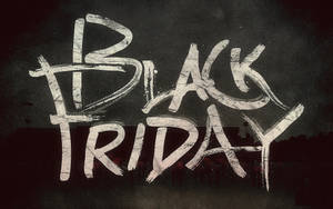 塗鴉文字喺深色牆上寫住Black Friday，配日落城市剪影。 — 塗鴉 壁紙