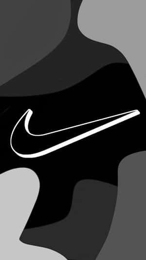 帶有白色Nike swoosh標誌的抽象黑白背景。