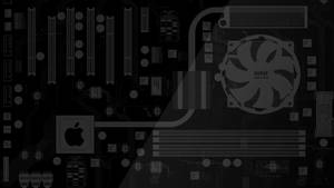 主機板上 Intel Core 2 Duo CPU 風扇和 Apple 標誌的特寫。 — 蘋果 壁紙