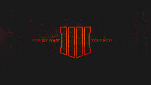 在深色垃圾背景上帶有文字「FORGET WHAT YOU KNOW」的發光橙色標誌。 — 使命召喚黑色行動4 壁紙
