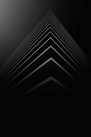 抽象黑白建築線條形成尖銳向上的箭頭。