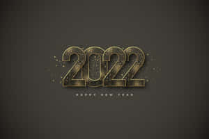 在深灰色背景上慶祝新年的金色2022文字和閃爍。