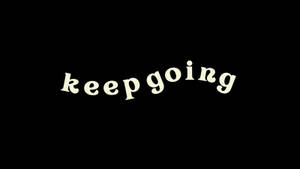 黑色背景上以白色草書寫住「keep going」嘅勵志文字。