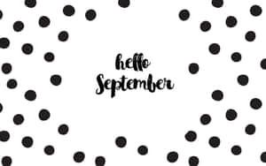 黑色圓點圍繞著白色背景上手寫的文字「hello September」。 — 九月 壁紙