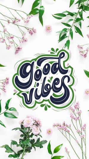 Good vibes 文字被粉紅色花朵和綠色葉子環繞，背景為白色。 — 花卉 iPhone 壁紙