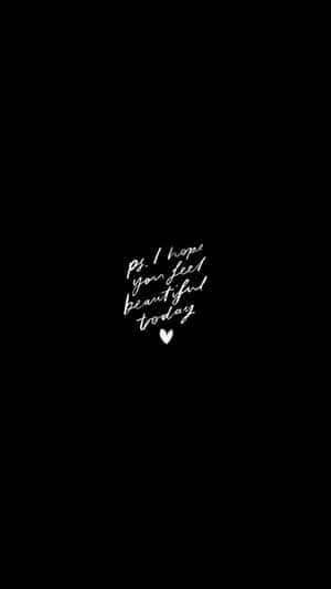 黑色背景上的白色手寫文字寫著「Ps I hope you feel beautiful today」，並附有一個小心形。