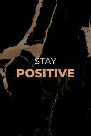 黑金大理石背景上的勵志名言 stay positive — Huawei MatePad 12 X (2025) 壁紙