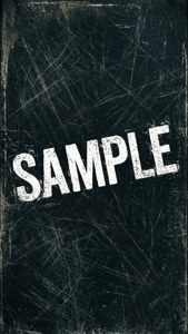 磨損的黑色表面，帶有白色印字，內容為sample。